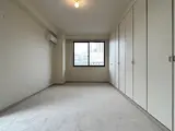 フラッツ砂土原 主寝室